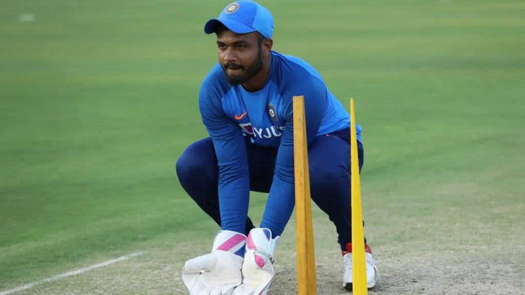 Sanju Samson biography: Samson in wicketkeeping stance at India training.