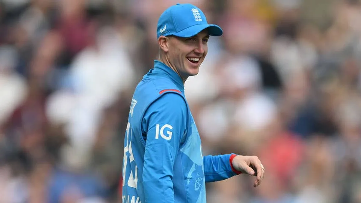 Harry Brook biography: Harry Brook smiling in the England blue ODI cap and training top, photo from his white-ball captain appointment