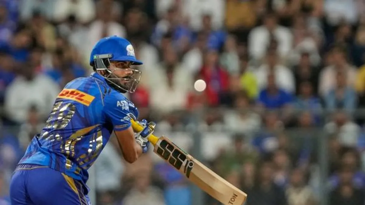 Naman Dhir biography: Naman Dhir in Mumbai Indians blue