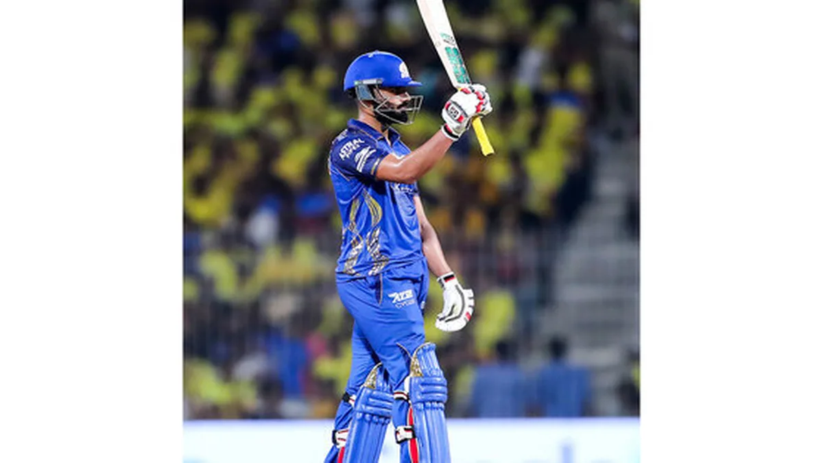 Naman Dhir biography: Naman Dhir playing a shot