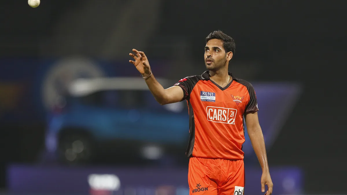 bhuvneshwar kumar biography: Bhuvneshwar Kumar watching the ball in SRH orange