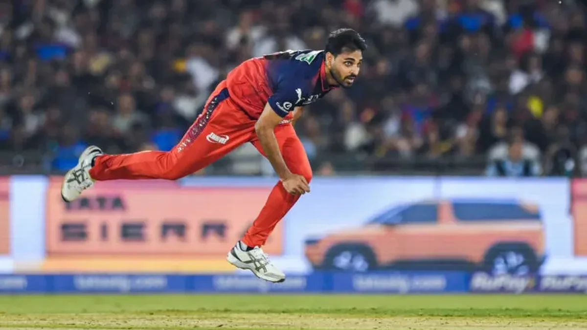 bhuvneshwar kumar biography: Bhuvneshwar Kumar bowling for RCB in IPL 2026