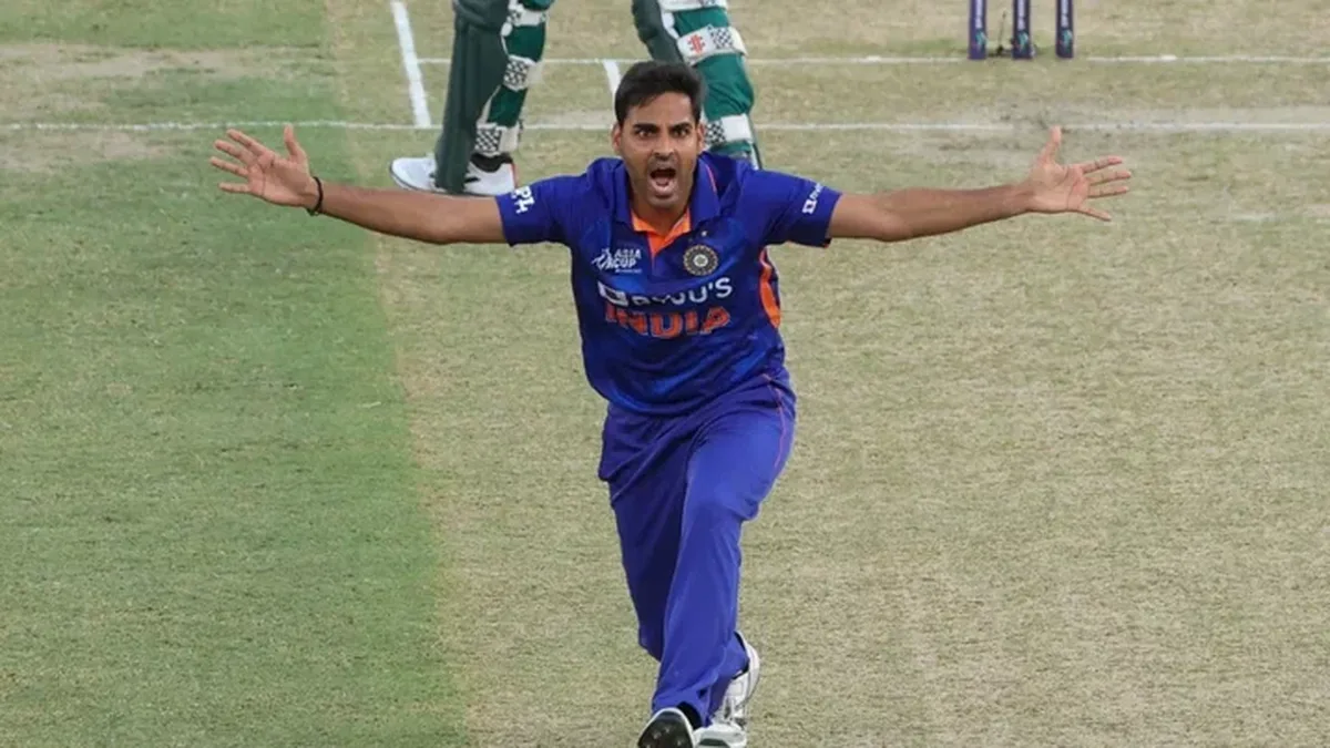 bhuvneshwar kumar biography: Bhuvneshwar Kumar celebrating a wicket for India