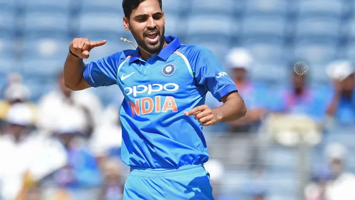 bhuvneshwar kumar biography: Bhuvneshwar Kumar celebrating a wicket in the India ODI jersey