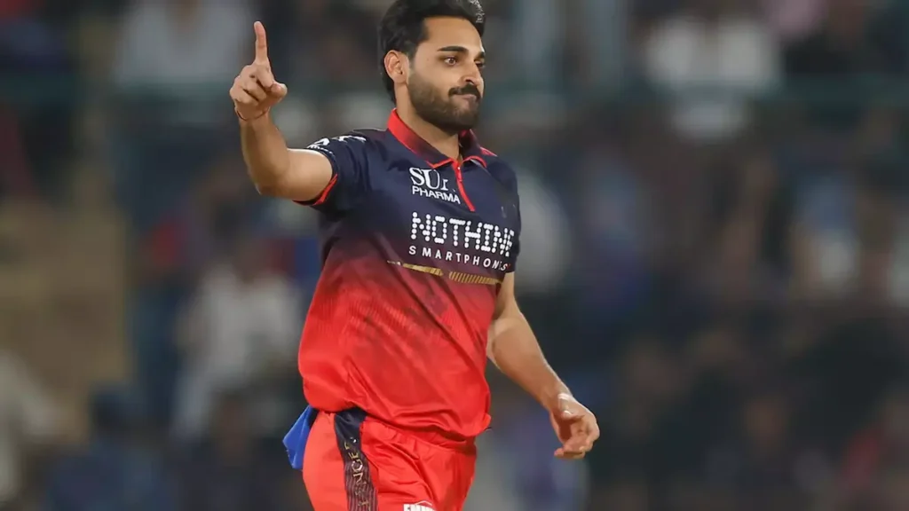 bhuvneshwar kumar biography: Bhuvneshwar Kumar celebrates a wicket for Royal Challengers Bengaluru in the IPL